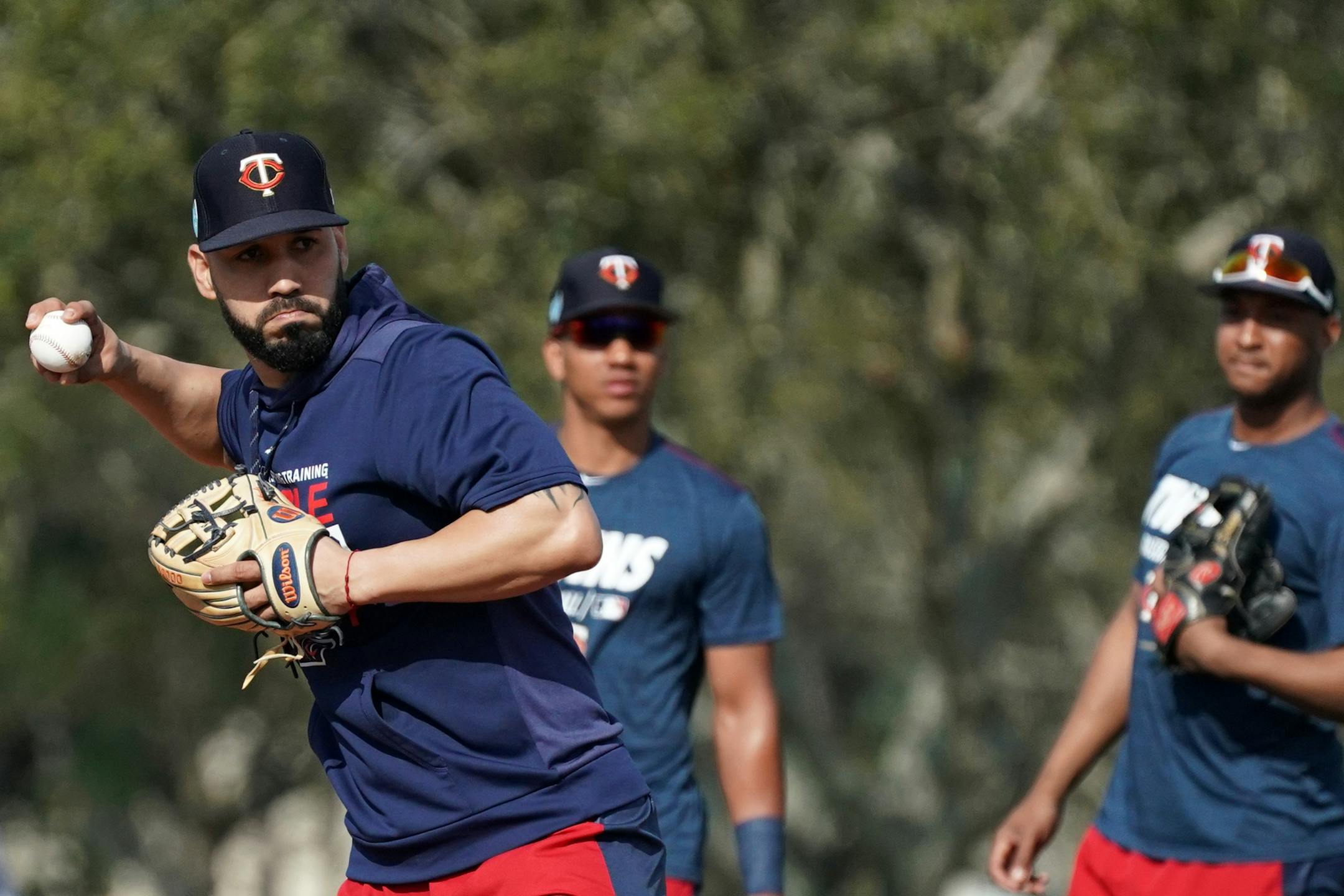 Newly acquired Minnesota Twins utility player Marwin Gonzalez (9) joined his teammates on the practice field for workouts Monday morning.