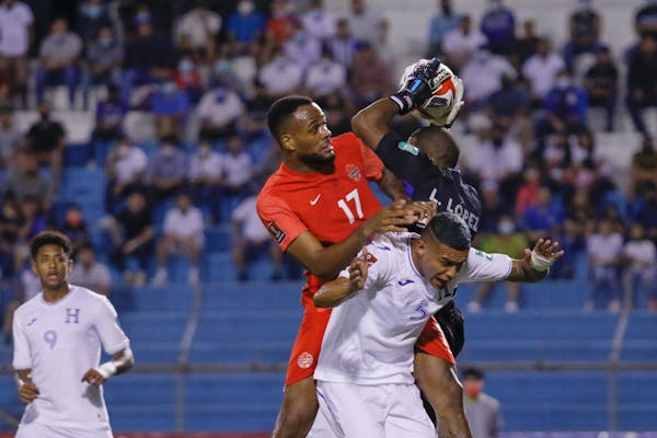 Honduras’ Kervin Arriaga, bottom, fought for the ball in a World Cup qualifying match against Canada in January.