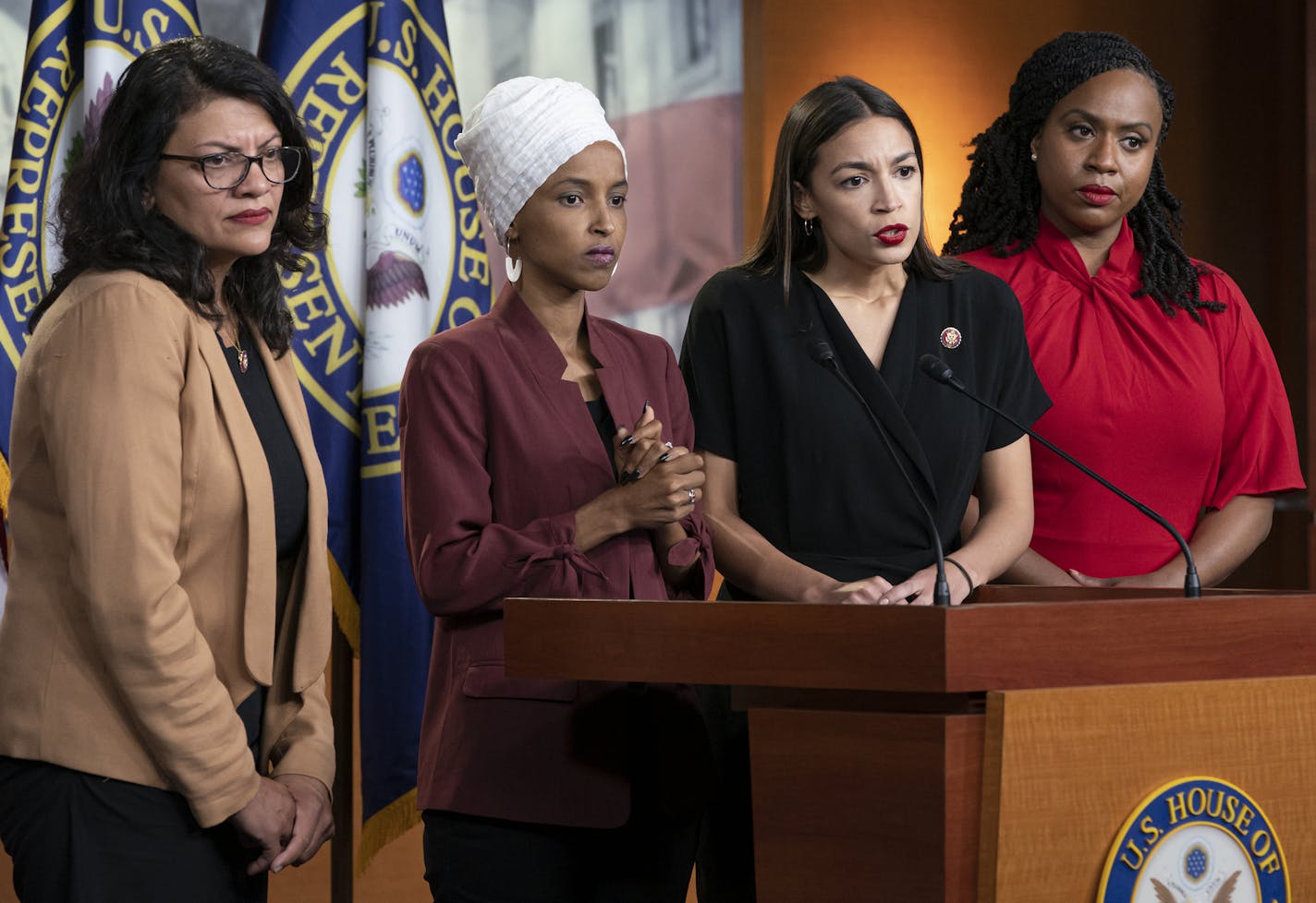 From left, Rep. Rashida Tlaib, D-Mich., Rep. Ilhan Omar, D-Minn., Rep. Alexandria Ocasio-Cortez, D-N.Y., and Rep. Ayanna Pressley, D-Mass., respond to remarks by President Donald Trump after his call for the four Democratic congresswomen to go back to their "broken" countries, during a news conference at the Capitol in Washington, Monday, July 15, 2019. All are American citizens and three of the four were born in the U.S. (AP Photo/J. Scott Applewhite)