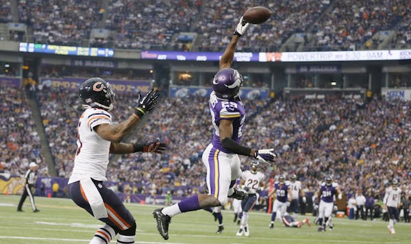 Vikings cornerback Xavier Rhodes tipped a pass away from Bears wide receiver Brandon Marshall last December. New Vikings coach Mike Zimmer is pleased 