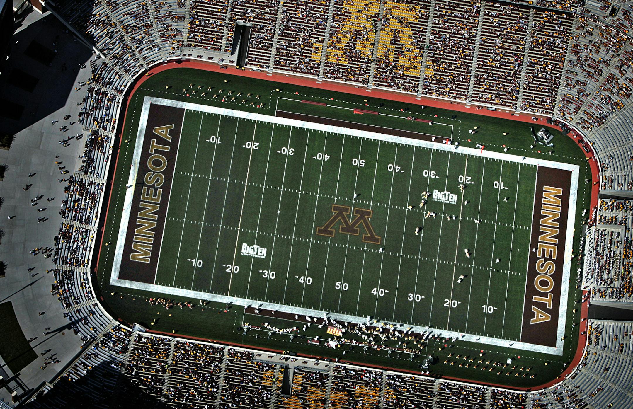TCF Bank Stadium, shown during a 2009 Gophers football scrimmage that was the first public event there, will get a “field heating system” and will have artificial turf replaced as part of the upgrades.