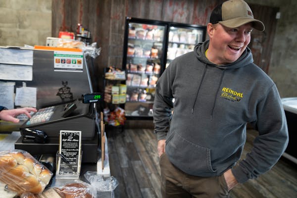 Greg Ladwig bought meat, bread and cheese at Conger Meat Market in Conger, Minn. on Dec. 11.