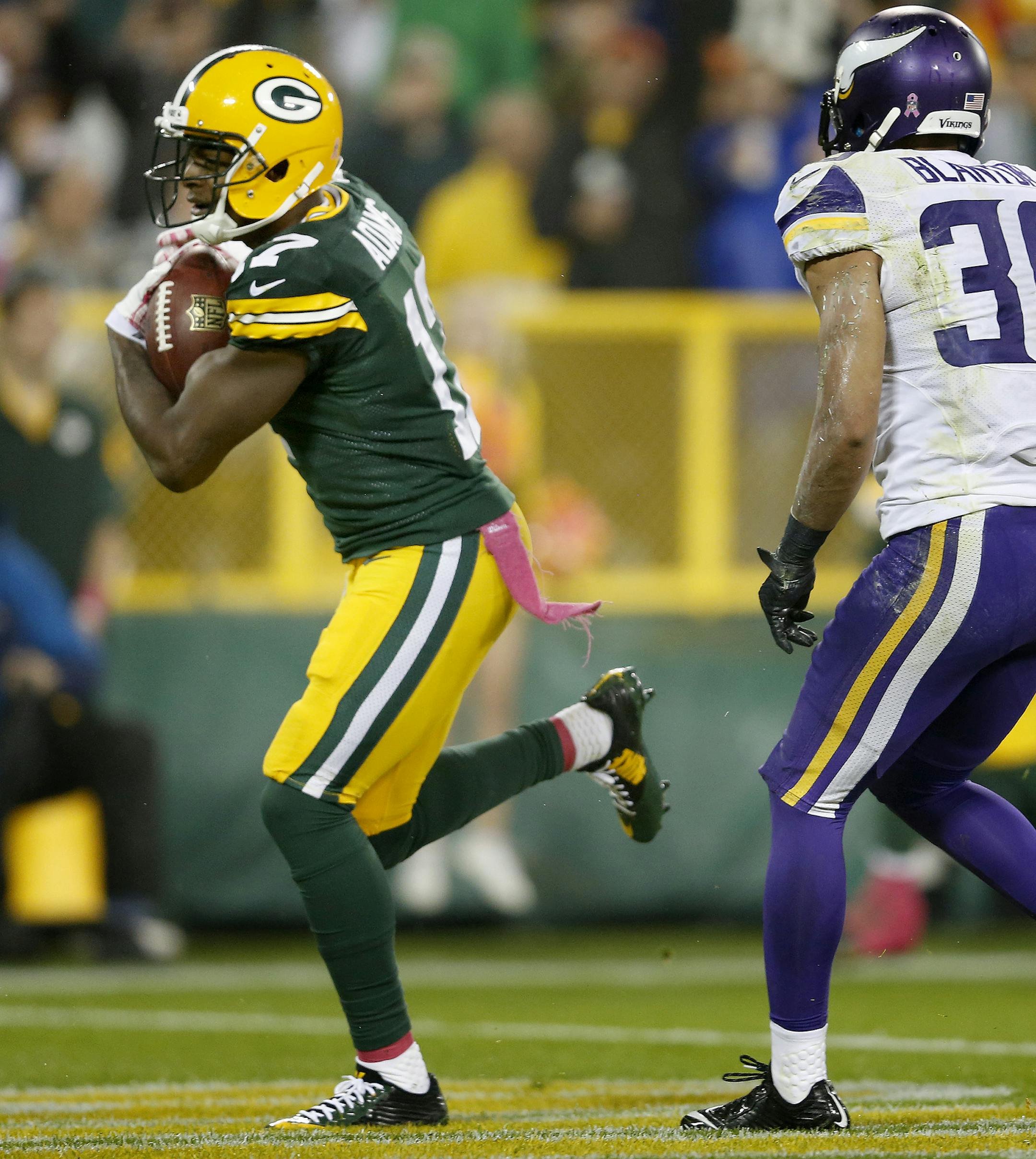 Davante Adams (17) ran past Robert Blanton (36) to score a touchdown on the second quarter. ] CARLOS GONZALEZ cgonzalez@startribune.com - October 2, 2014 , Green Bay, WI NFL, Lambeau Field, Minnesota Vikings vs. Green bay Packers