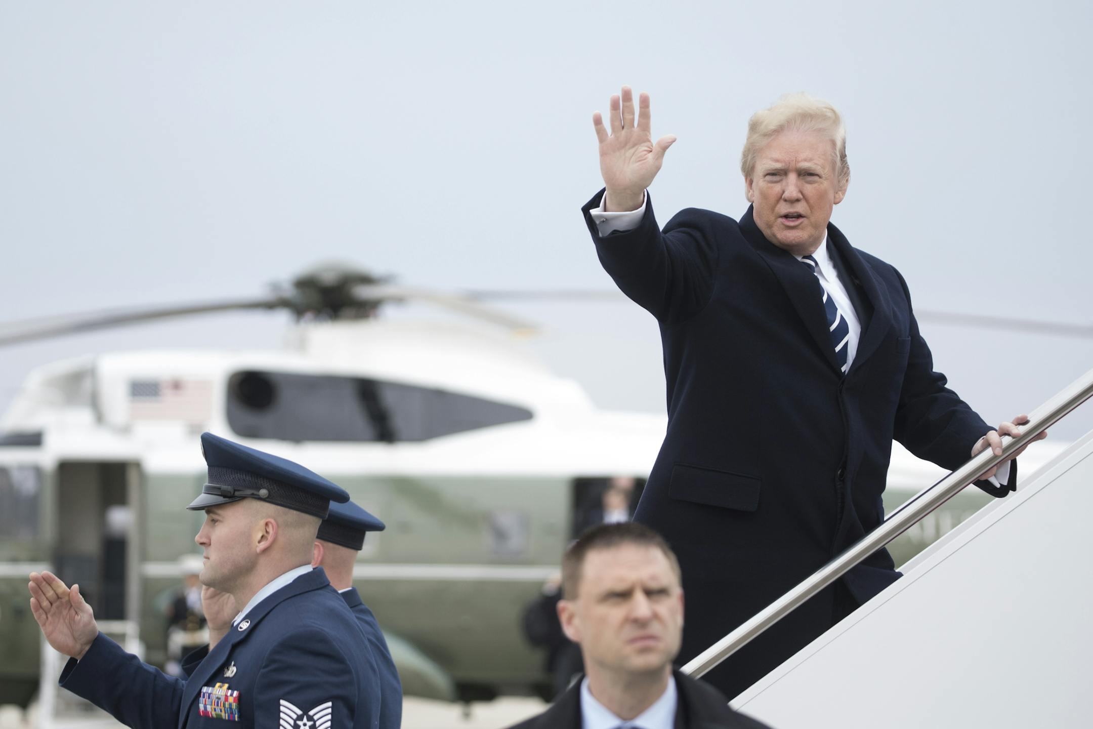 President Donald Trump boards Air Force One at Andrews Air Force Base in Maryland, Feb. 1, 2018, en route to a House and Senate Republican conference at the Greenbrier in West Virginia. (Tom Brenner/ The New York Times)