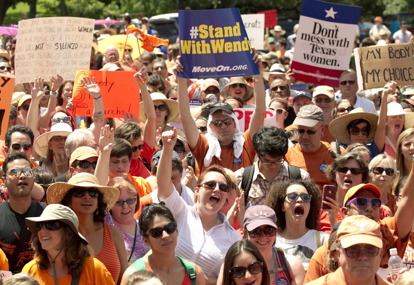 Abortion rights supporters rally on the south lawn of the state Capitol in Austin, Texas, on Monday July 1, 2013. The Texas Senate has convened for a new 30-day special session to take up contentious abortion restrictions bill and other issues.