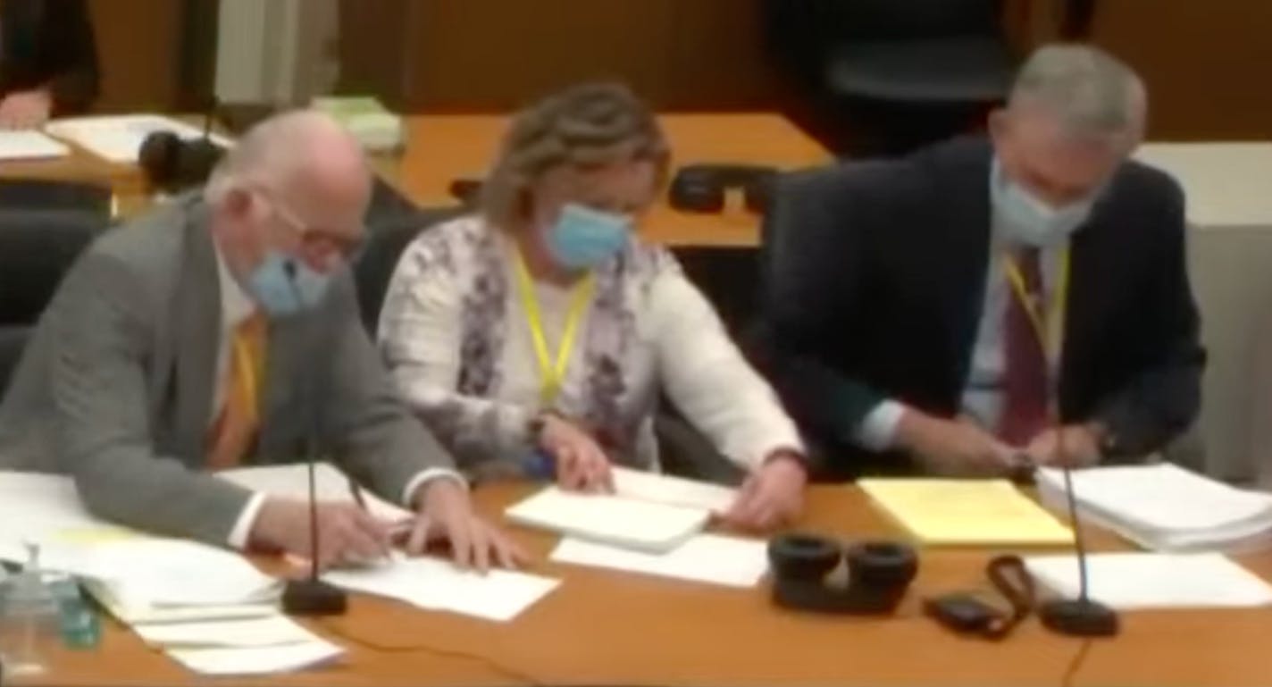 In this screen grab from video, former Brooklyn Center police Officer Kimberly Potter, middle, is flanked by defense attorney Earl Gray, left, and defense attorney Paul Engh during jury selection Wednesday, Dec. 1, 2021 at the Hennepin County Courthouse in Minneapolis, Minn. (Court TV, Pool)