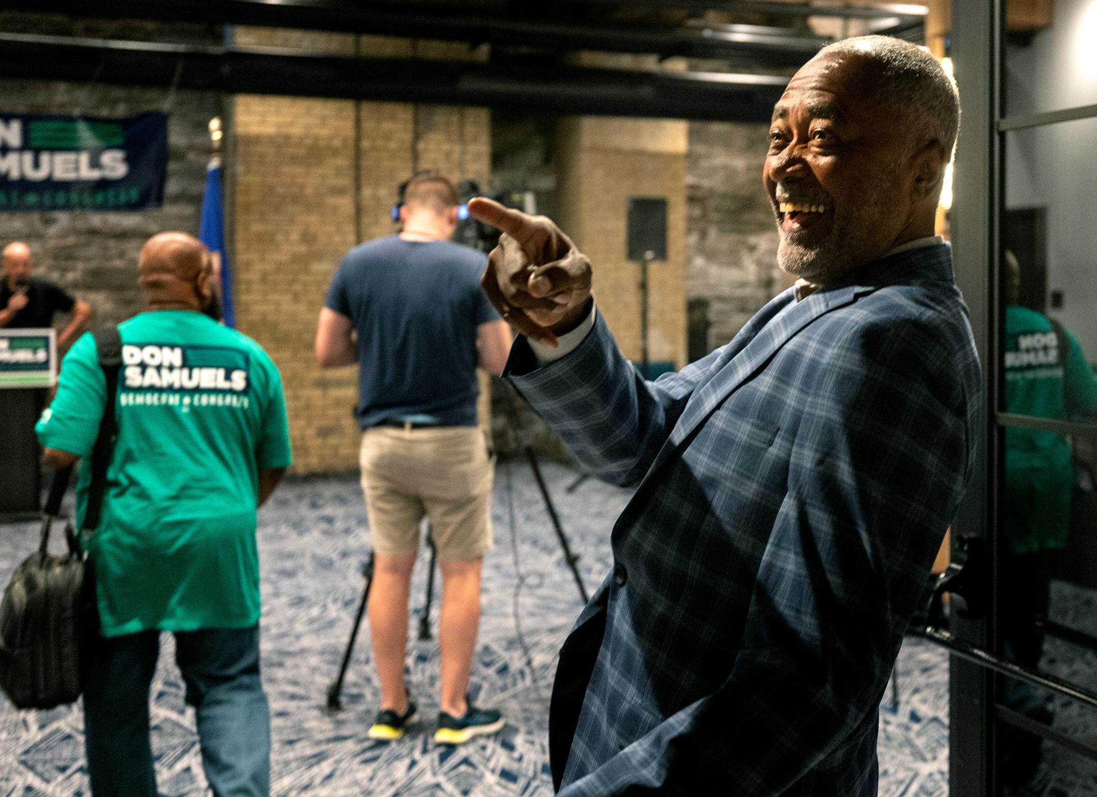 Don Samuels is greeted by supporters at his primary election night watch party.