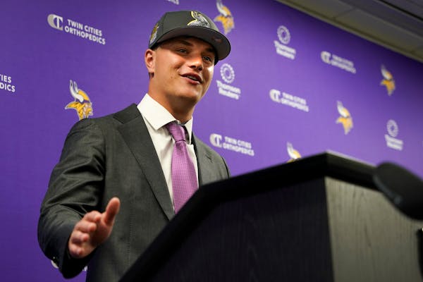 J.J. McCarthy speaks at an introductory news conference in Eagan on Friday. One of the biggest questions once the Vikings convene next month will be h