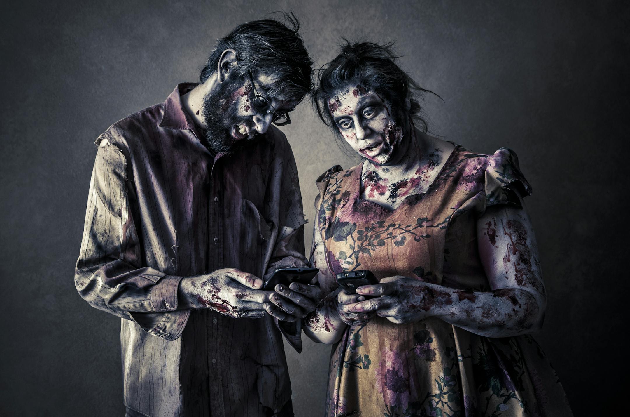 iStockphoto.com
Zombie Couple On Their Cell Phones.