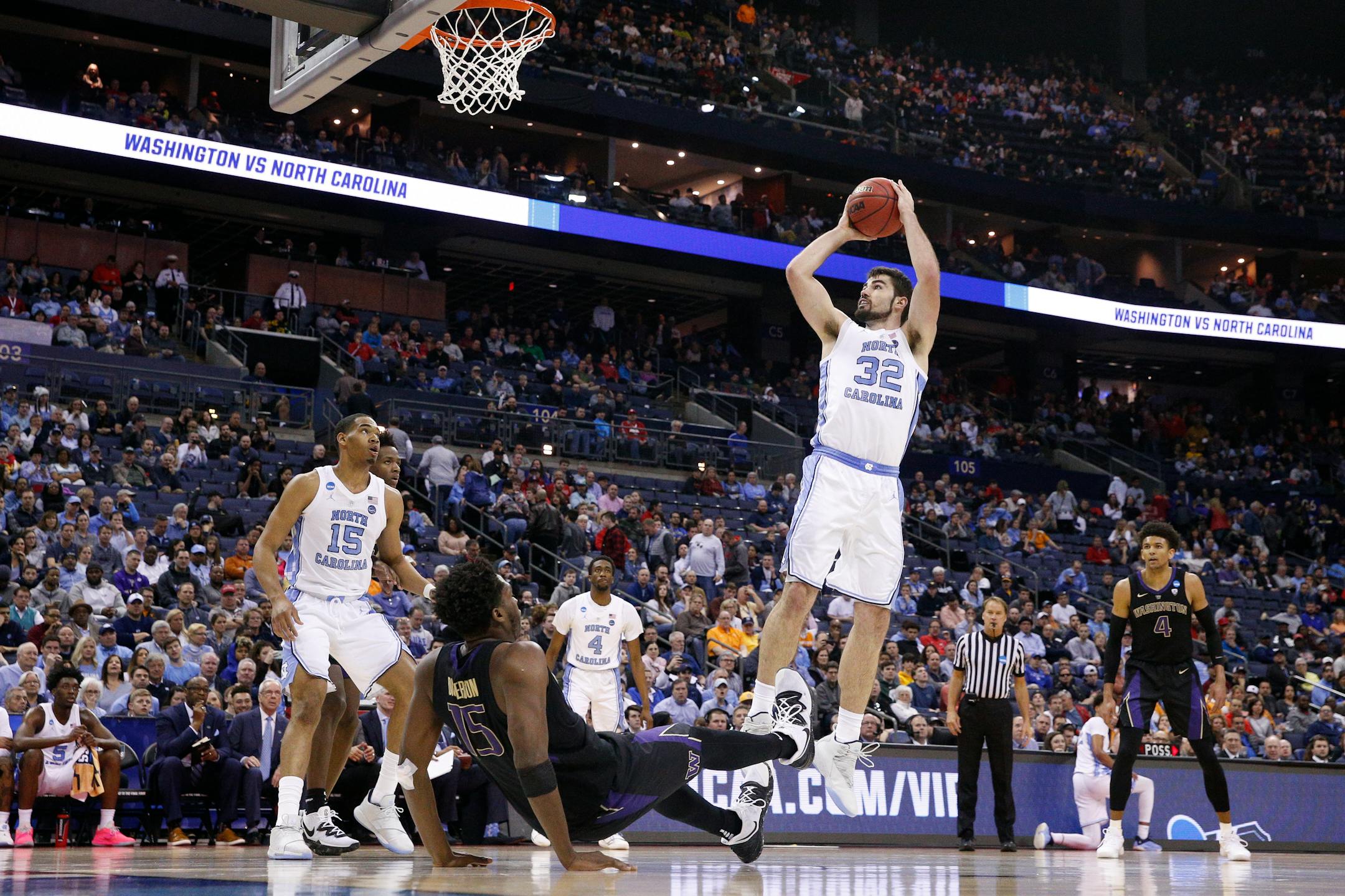 North Carolina's Luke Maye (32) shoots in the second half during a second round men's college basketball game against Washington in the NCAA Tournament, Sunday, March 24, 2019, in Columbus, Ohio. (AP Photo/John Minchillo)
