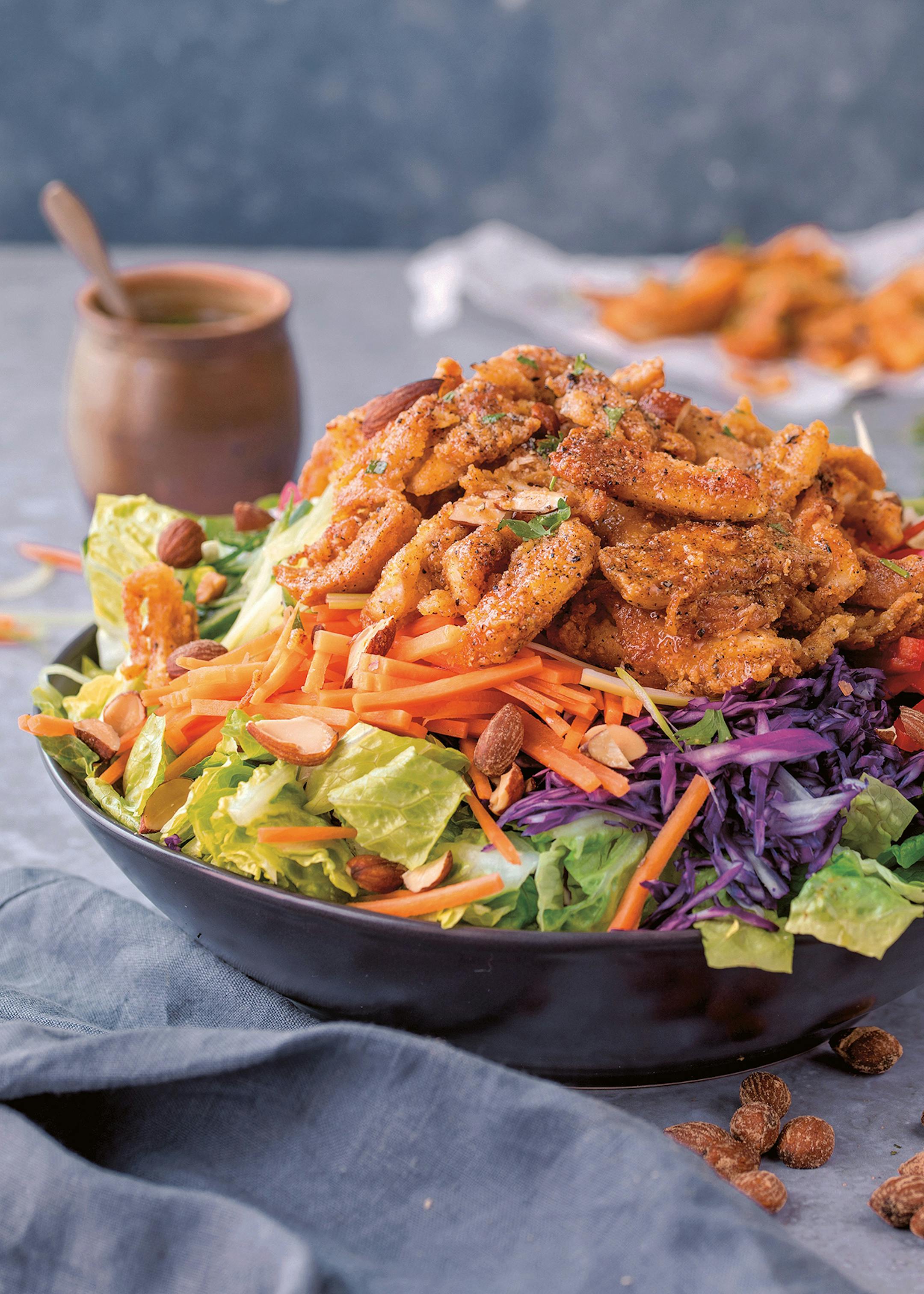Crispy Chicken Shredded Salad With Honey Mustard Dressing
Reprinted with permission from Seriously Good Salads by Nicky Corbishley, Page Street Publishing Co. 2019. Photo credit: Nicky Corbishley.
