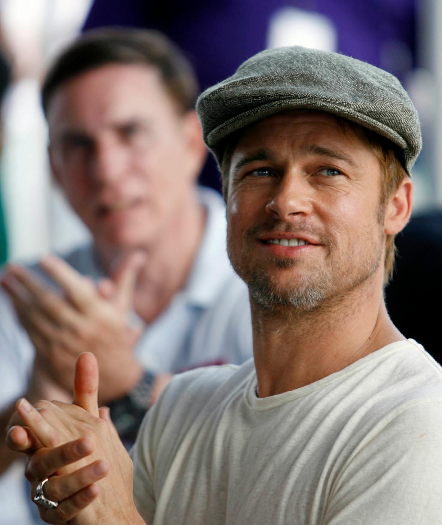 Brad Pitt and his newsboy cap appear to be inseparable.