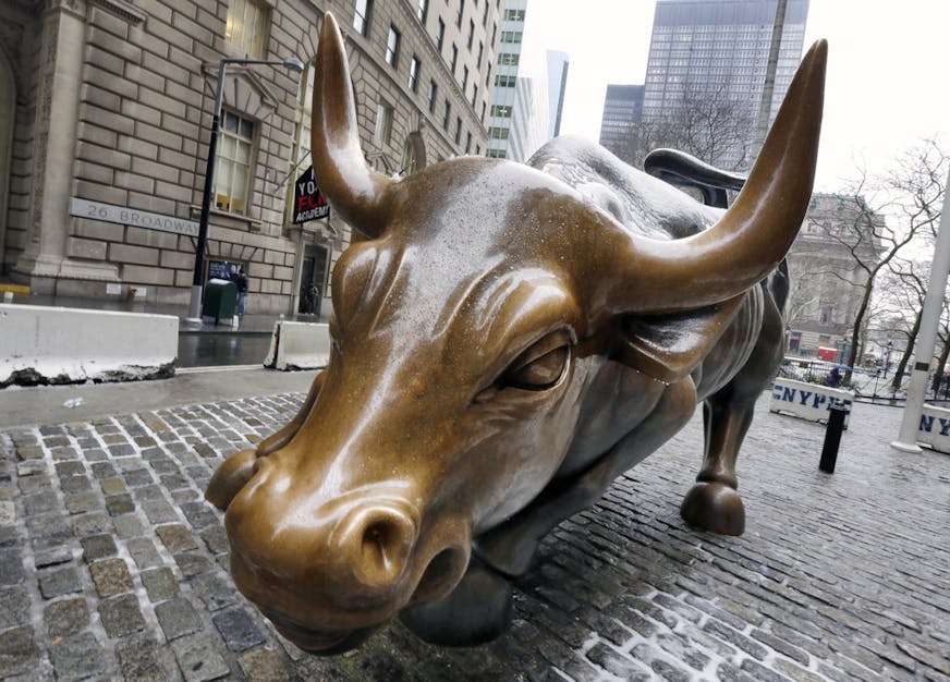The Charging Bull sculpture by Arturo Di Modica, in New York's Financial District, is shown in this photo, Wednesday, Feb. 7, 2018. The current bull market is set to turn nine years old in about a month. As of Jan. 26, the date of the last market record, the S&P 500 had more than quadrupled over that time. The market had made big gains over the last year, and many experts felt stocks were overdue for a slump. (AP Photo/Richard Drew)