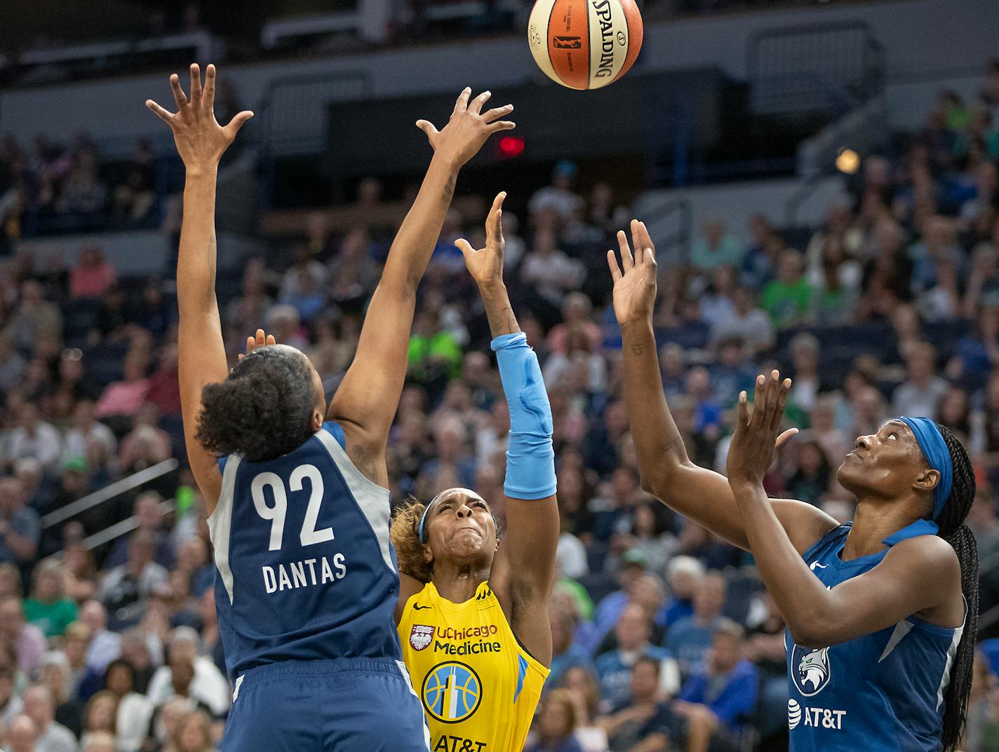 Damiris Dantas, left, and Sylvia Fowles, right, blocked Chicago's Cheyenne Parker