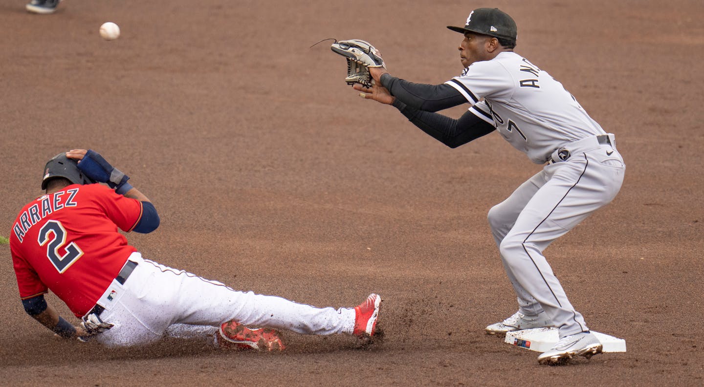 Minnesota Twins second baseman Luis Arraez, (2), is safe at second as Chicago White Sox shortstop Tim Anderson, (7) waits fo ball in Minneapolis, Minn., on Sunday, April 24, 2022.