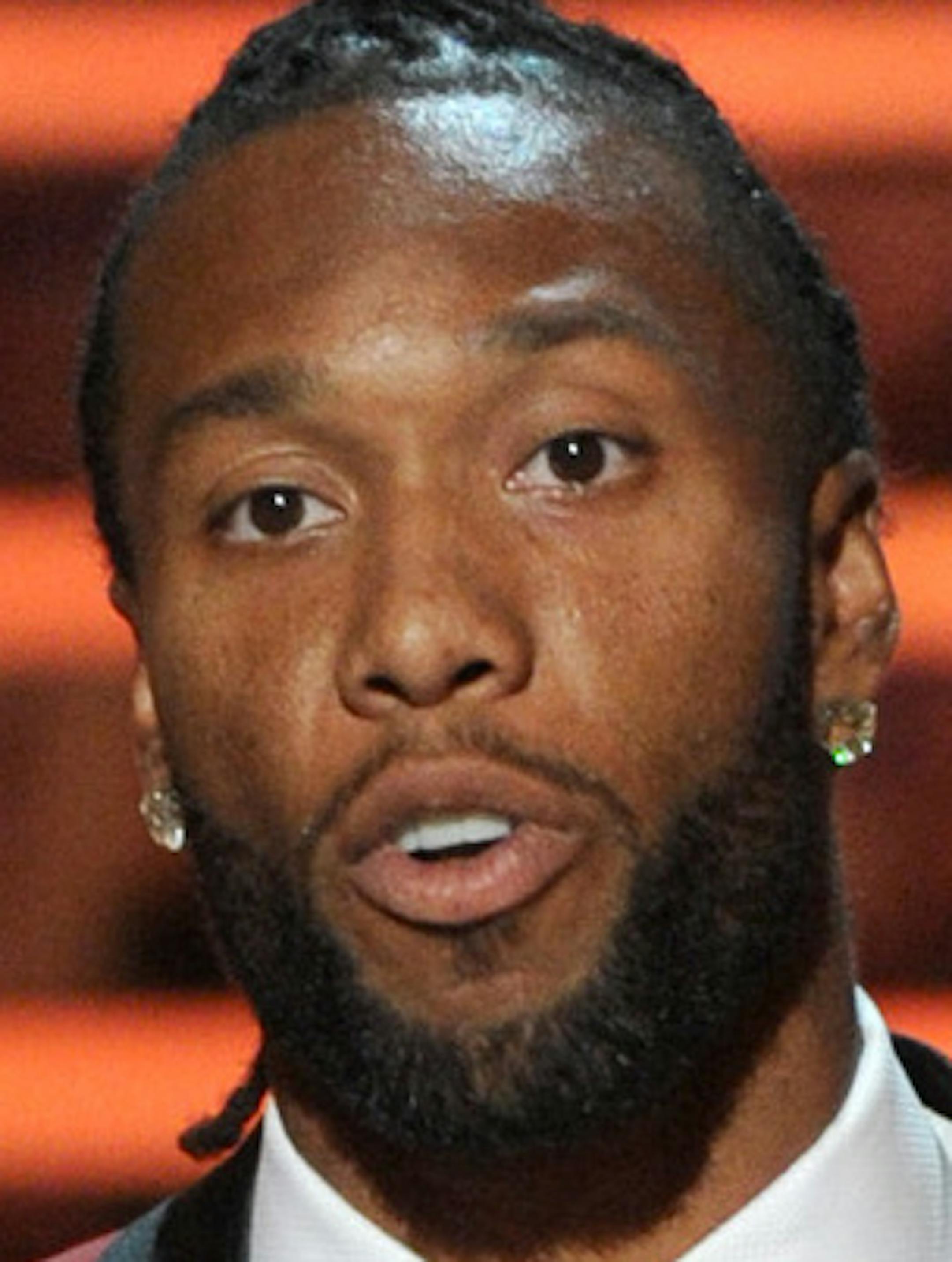 Larry Fitzgerald, of the Arizona Cardinals, accepts the Art Rooney award, presented by Bose, on stage at the 4th annual NFL Honors at the Phoenix Convention Center Symphony Hall on Saturday, Jan. 1, 2015. (Photo by Frank Micelotta/Invision for NFL/AP Images) ORG XMIT: INVL
