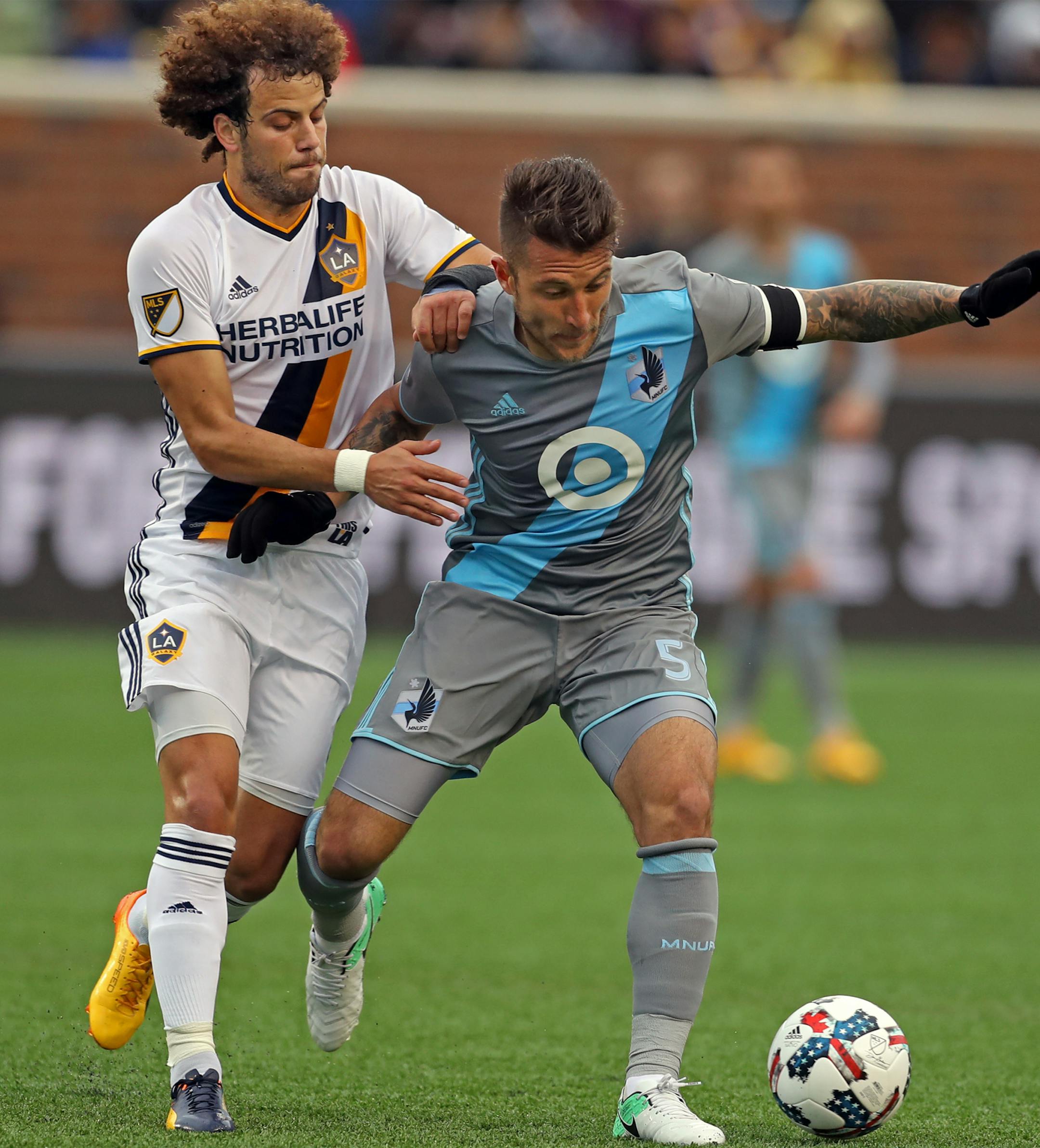 Joao Pedro(8) clashes with Francisco Calvo(5) of the Loons. ] soccer game action, Loons host Los Angeles at TCF Stadium in Minneapolis.Richard Tsong-Taatariiïrichard.tsong-taatarii@startribune.com