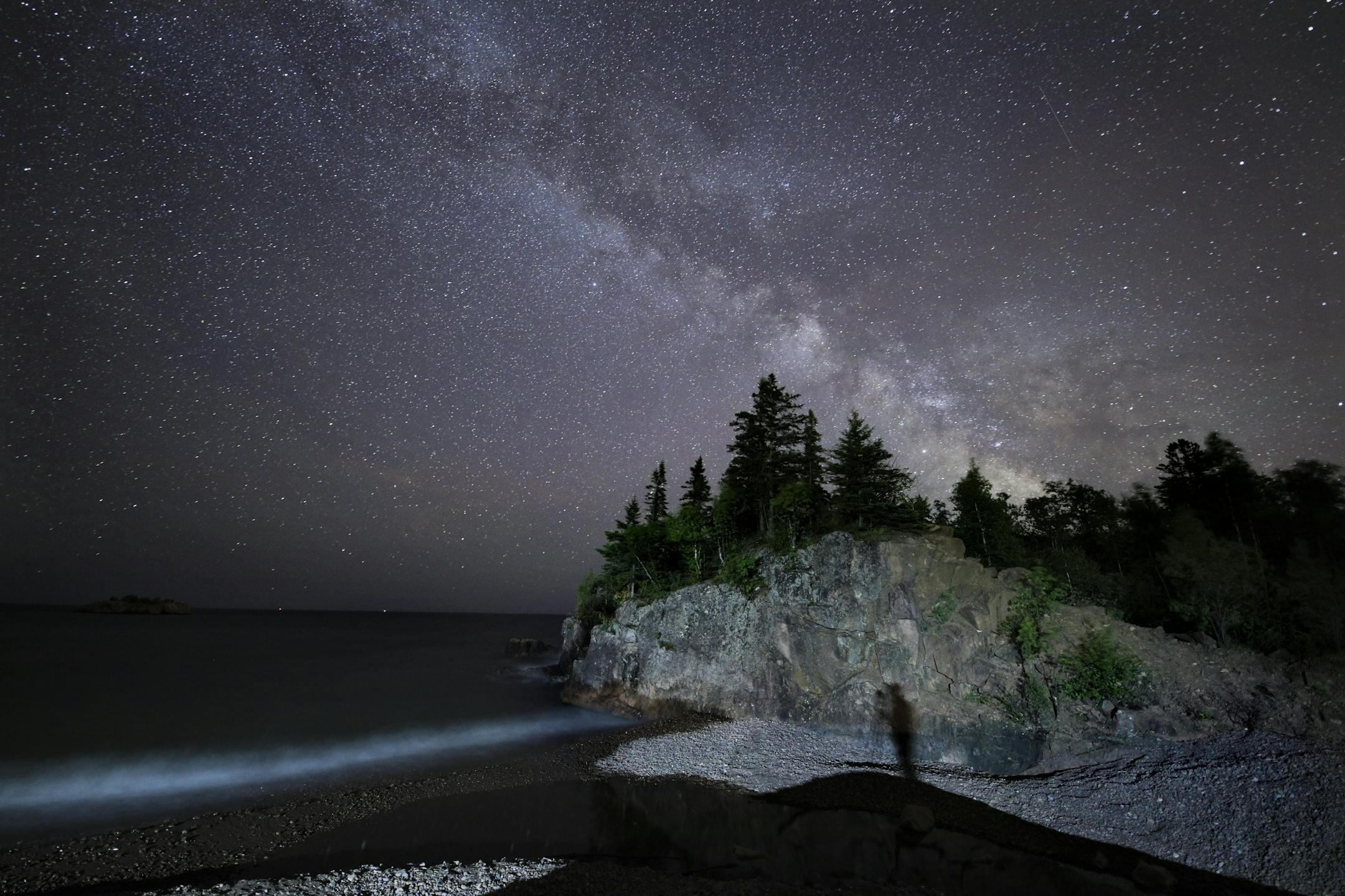 Day-9 - The Milky Way glows above the shore of Lake Superior near Silver Bay. Dark skies full of stars are just one of the thrills of camping out on the Superior Hiking Trail.