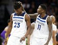 Timberwolves guard Jamal Crawford (11) celebrates a play with Jimmy Butler earlier this season.