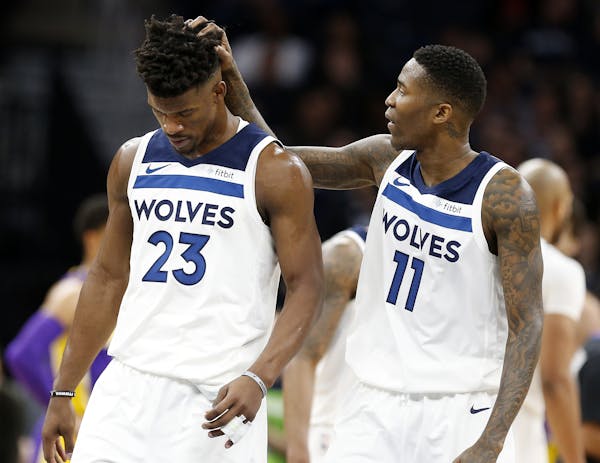 Timberwolves guard Jamal Crawford (11) celebrates a play with Jimmy Butler earlier this season.
