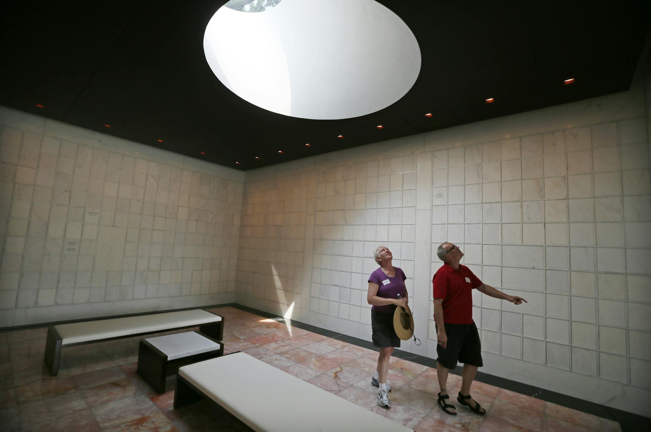 Ted Page right, and Kathlene Moore were part of a group of people that gathered at Lakewood Cemetery's Mausoleum to talk about death Sunday July 7, 2013 in Minneapolis, MN . ] JERRY HOLT ‚Ä¢ jerry.holt@startribune.com