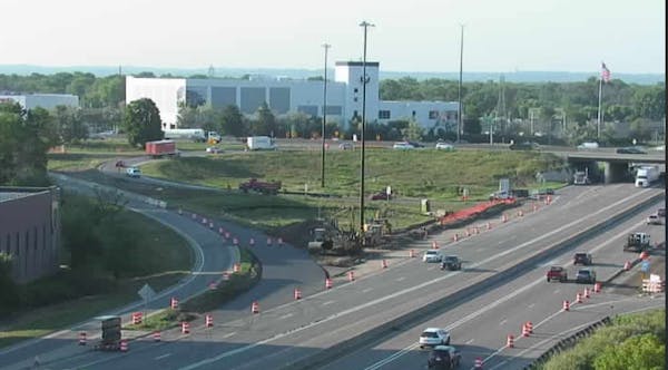 Orange cones and barrels sit on the shoulders of I-35W in Richfield ahead of this weekend’s freeway closure.