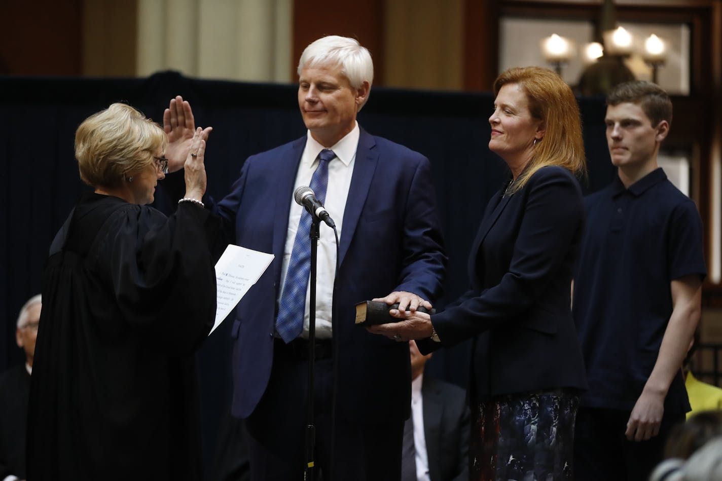 Paul C. Thissen with his wife Karen Wilson Thissen holding the bible took the oath administered by Chief Justice Lorie Skjerven Gildea .] Gov. Mark Dayton will provide remarksat the Minnesota Supreme Court Public Investiture Ceremony forRichard Tsong-Taatarii&#xef;rtsong-taatarii@startribune.com