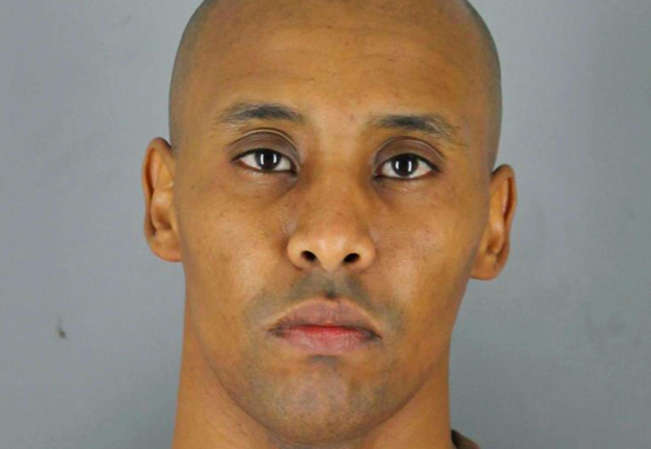 This April 30, 2019, booking photo released by Hennepin County Sheriff's Office shows Mohamed Noor, the former Minneapolis police officer who was convicted of murder in the 2017 shooting death of Justine Ruszczyk Damond, who had called 911 about a possible sexual assault outside her south Minneapolis home. ORG XMIT: MER1dec5610549beb801fa49ae2c3189
