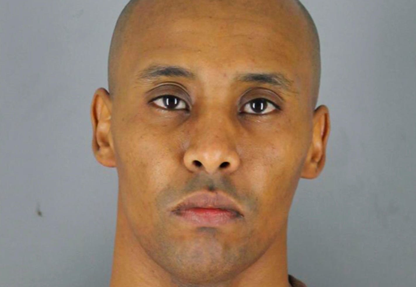 This April 30, 2019, booking photo released by Hennepin County Sheriff's Office shows Mohamed Noor, the former Minneapolis police officer who was convicted of murder in the 2017 shooting death of Justine Ruszczyk Damond, who had called 911 about a possible sexual assault outside her south Minneapolis home. ORG XMIT: MER1dec5610549beb801fa49ae2c3189
