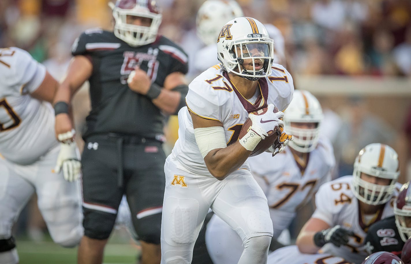 A meeting between coach P.J. Fleck and Seth Green in the spring led to the one-time East Ridge star switching positions.Green scored a pair of touchdowns in last week's opener.