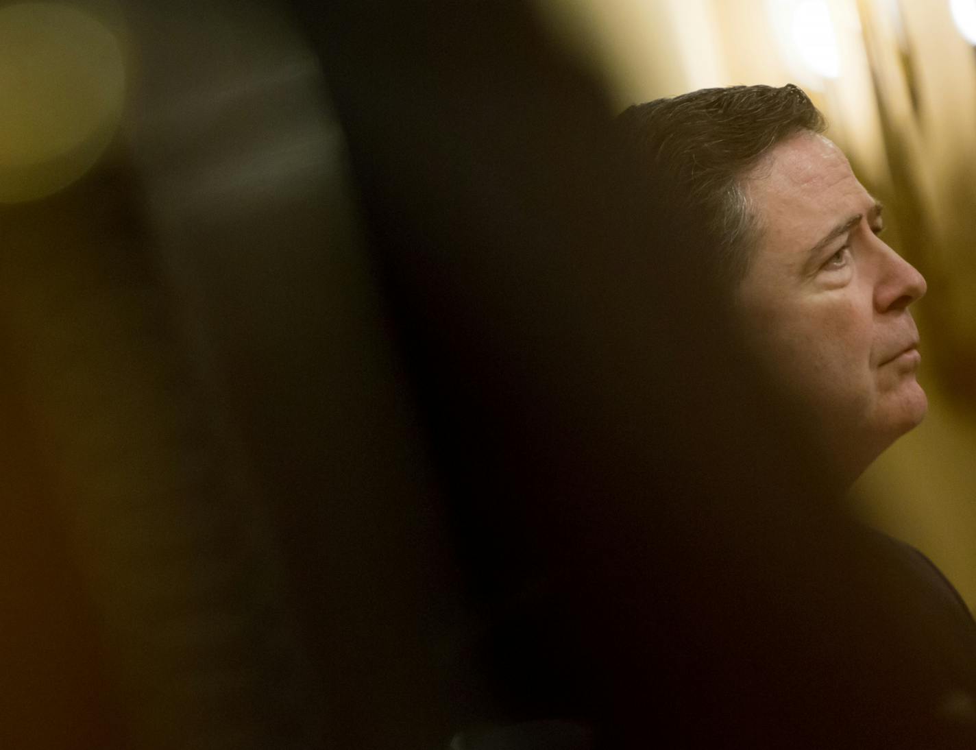 FBI Director James Comey testifies before the House Permanent Select Committee on Intelligence on Capitol Hill, in Washington, March 20, 2017. Comey publicly confirmed an investigation into Russian interference in the presidential election and whether associates of the president were in contact with Moscow at the hearing on Monday. (Eric Thayer/The New York Times) ORG XMIT: MIN2017042214553808