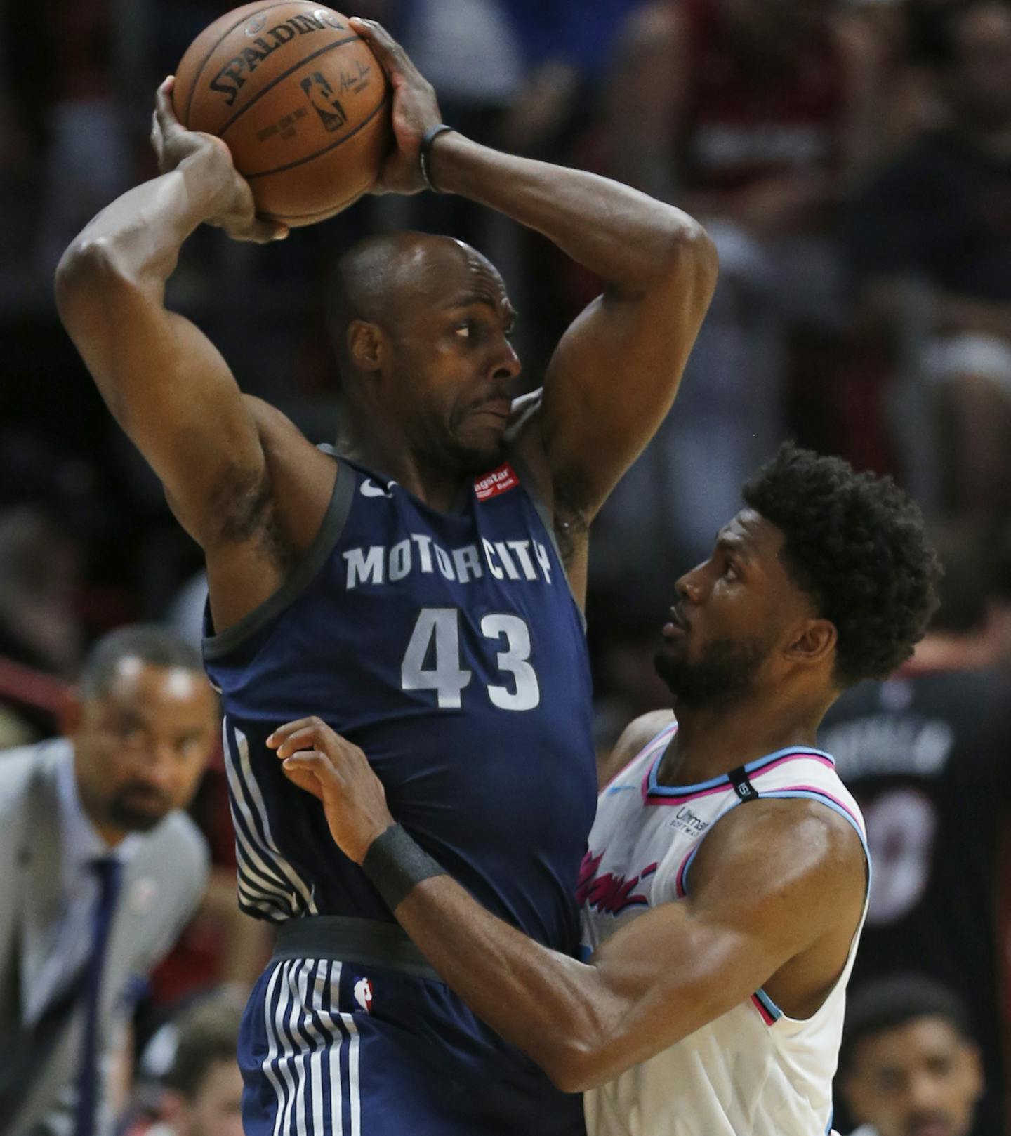 Detroit Pistons forward Anthony Tolliver (43) looks for an open teammate past Miami Heat forward Justise Winslow during the second half of an NBA basketball game, Saturday, March 3, 2018, in Miami. The Heat defeated the Pistons 105-96. (AP Photo/Wilfredo Lee) ORG XMIT: OTK