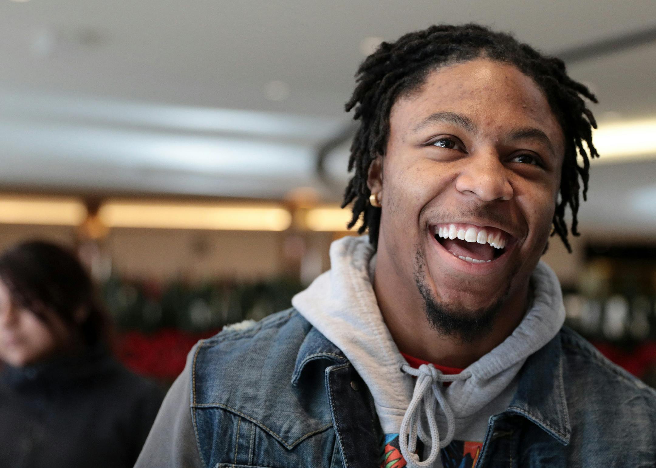 Rodney Smith laughs as he stands in line for lunch while shopping at the Mall of America. ] ANTHONY SOUFFLE &#x2022; anthony.souffle@startribune.com Gophers running back Rodney Smith went shopping Friday, Dec. 9, 2016 at the Mall of America in Bloomington, Minn. Originally from Georgia, Smith took off this year, ranking high among Big Ten running backs in touchdowns and yards.