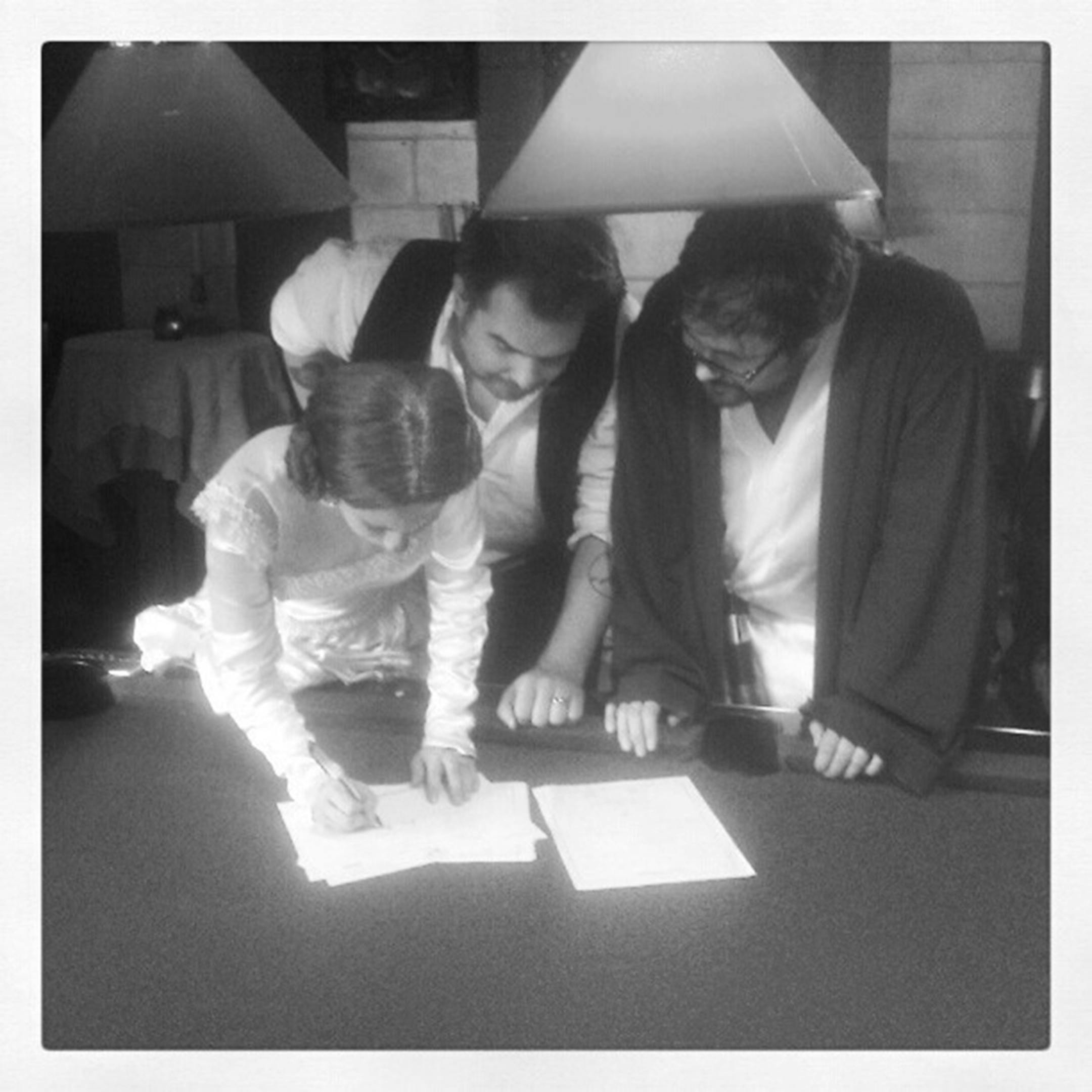 Turkeyes Laffity, left, and Thomas Maddux, center, were married in a "Star Wars"-themed wedding at the Kitty Cat Klub by Tom Reinger, their roommate and fellow band member.