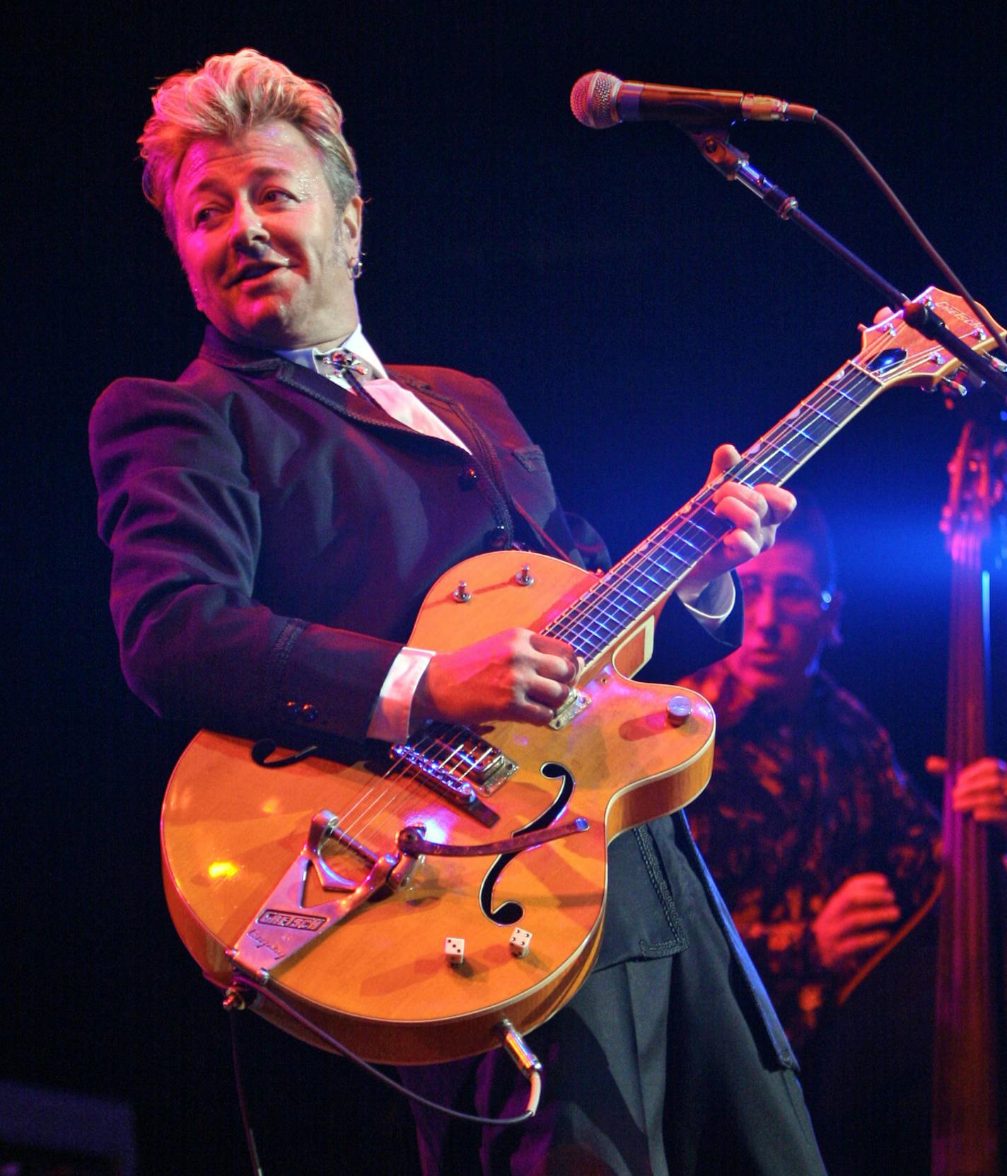 TOM SWEENEY &#x2022; tsweeney@startribune.com St. paul, MN 7/28/2007 FILE for future use, Mpls resident Brian Setzer, playing with the re-united ' Stray Cats', ( Lee Rocker , bass- basckground right) at Xcel center as part of the ' Jackfest' tour. ORG XMIT: MIN2013071013420978