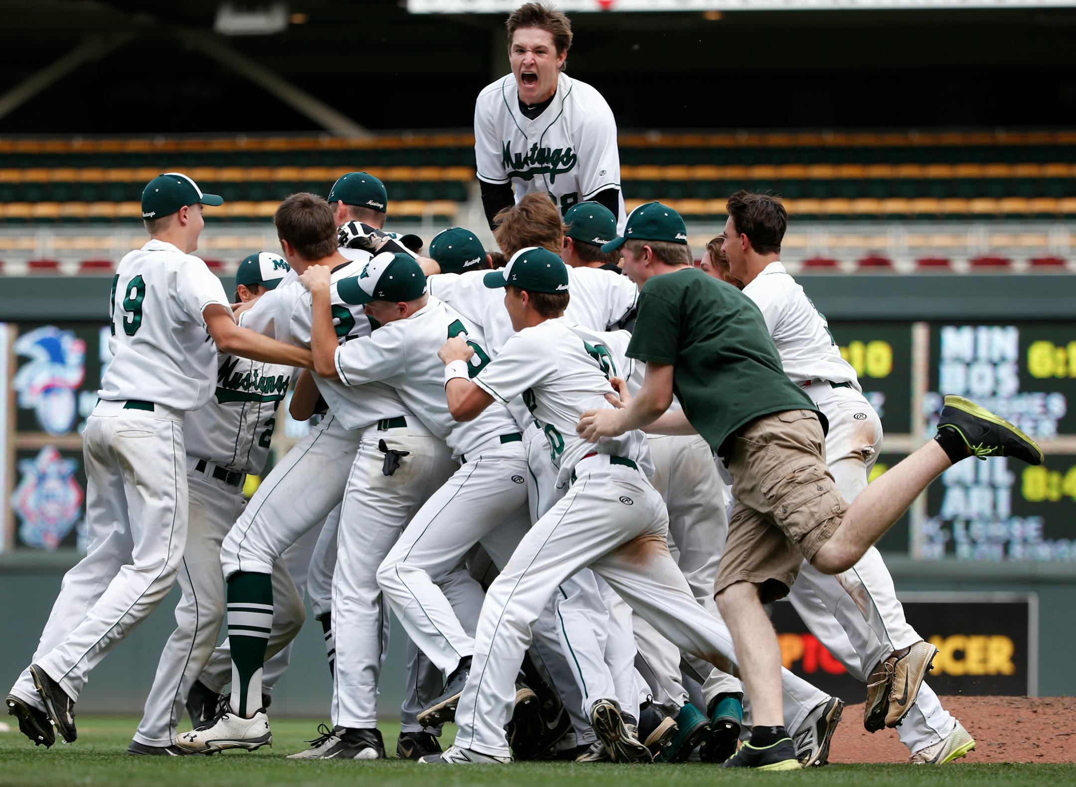 In the 3A championship game between Eden Prairie an Mounds View at Target Field on June 17, 2014, Mounds View celebrated its championship including Charlie Callahan(28) on top.]richard.tsong-taatarii/rtsong-taatarii@startribune.com