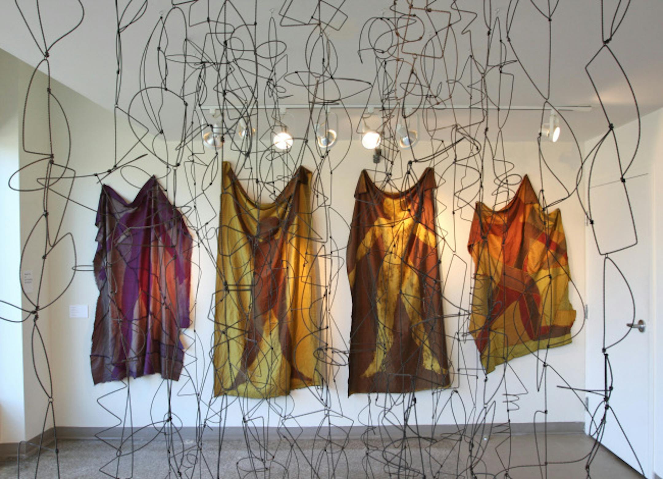Textile Center show, "Freedom: The Fiber of Our Nation. (front) "Small Thicket" by John Garrett and (rear) Alas Geneva" by Tim and Kathy Harding.