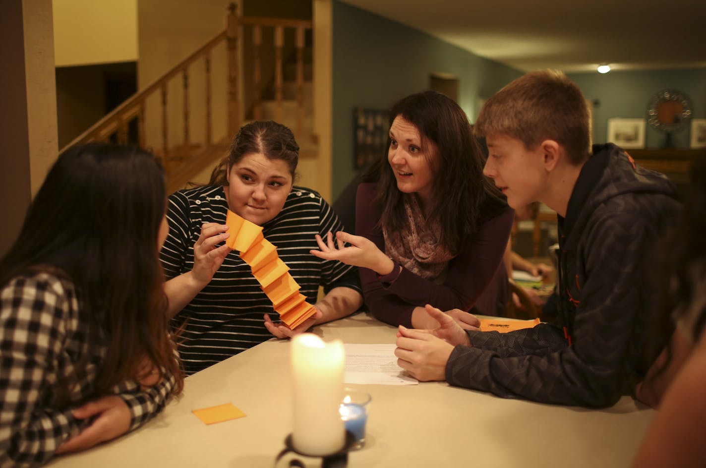 Rebecca Olson and her daughter, Ana, 18, discussed an essay topic for a college scholarship that Ana will be applying for with Ana's friend, Aitana Bell, left, and her son, Sam, 13 after dinner Thursday evening. ] JEFF WHEELER &#x2022; jeff.wheeler@startribune.com The Anoka County city of Blaine is about to eclipse Coon Rapids as the county's largest, but also climbing in terms of income, education and diversity, perhaps signaling the start of a shift for the traditionally blue collar county. To