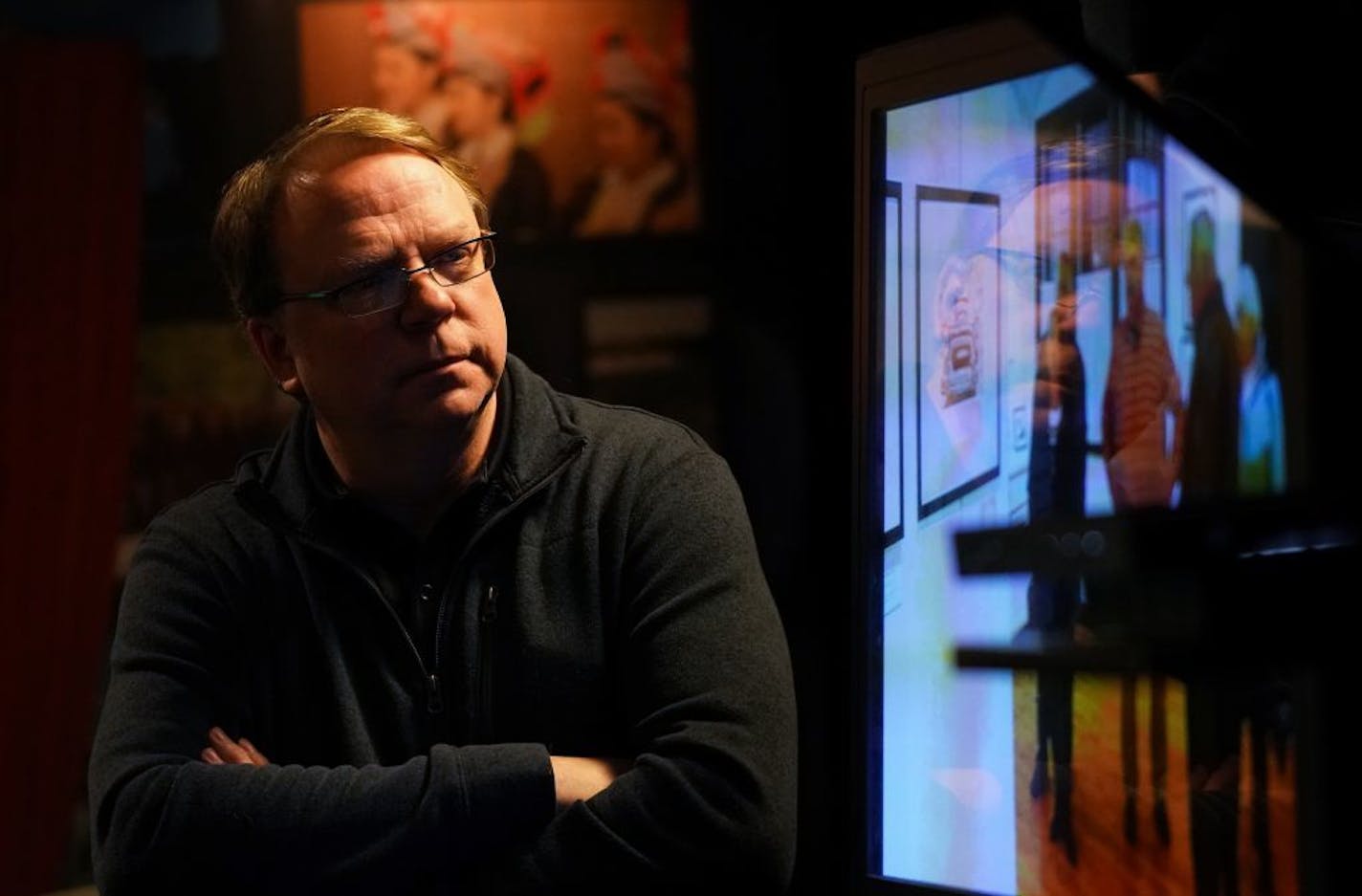 CCX Media Executive Director and General Manager Mike Johnson watched playback of a story on a monitor inside the studio during a live broadcast on Friday, Feb. 14, 2020.