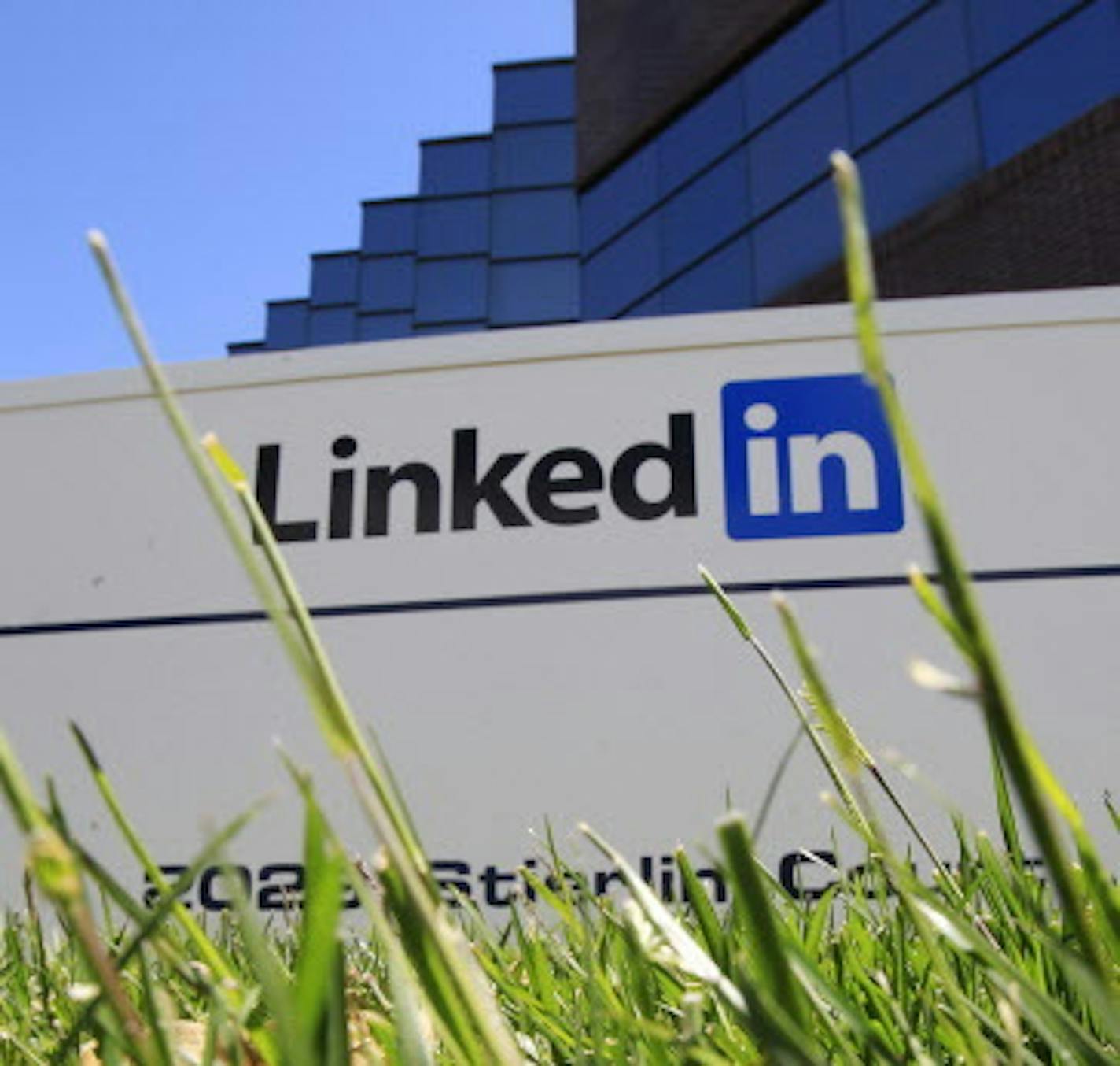 LinkedIn Corp., the professional networking Web site, displays its logo outside of headquarters in Mountain View, Calif., Monday, May 9, 2011. LinkedIn Corp. plans to sell shares to investors for $32 to $35 each in an initial public offering, one of the first for a major U.S. social networking site. (AP Photo/Paul Sakuma) ORG XMIT: CAPS108