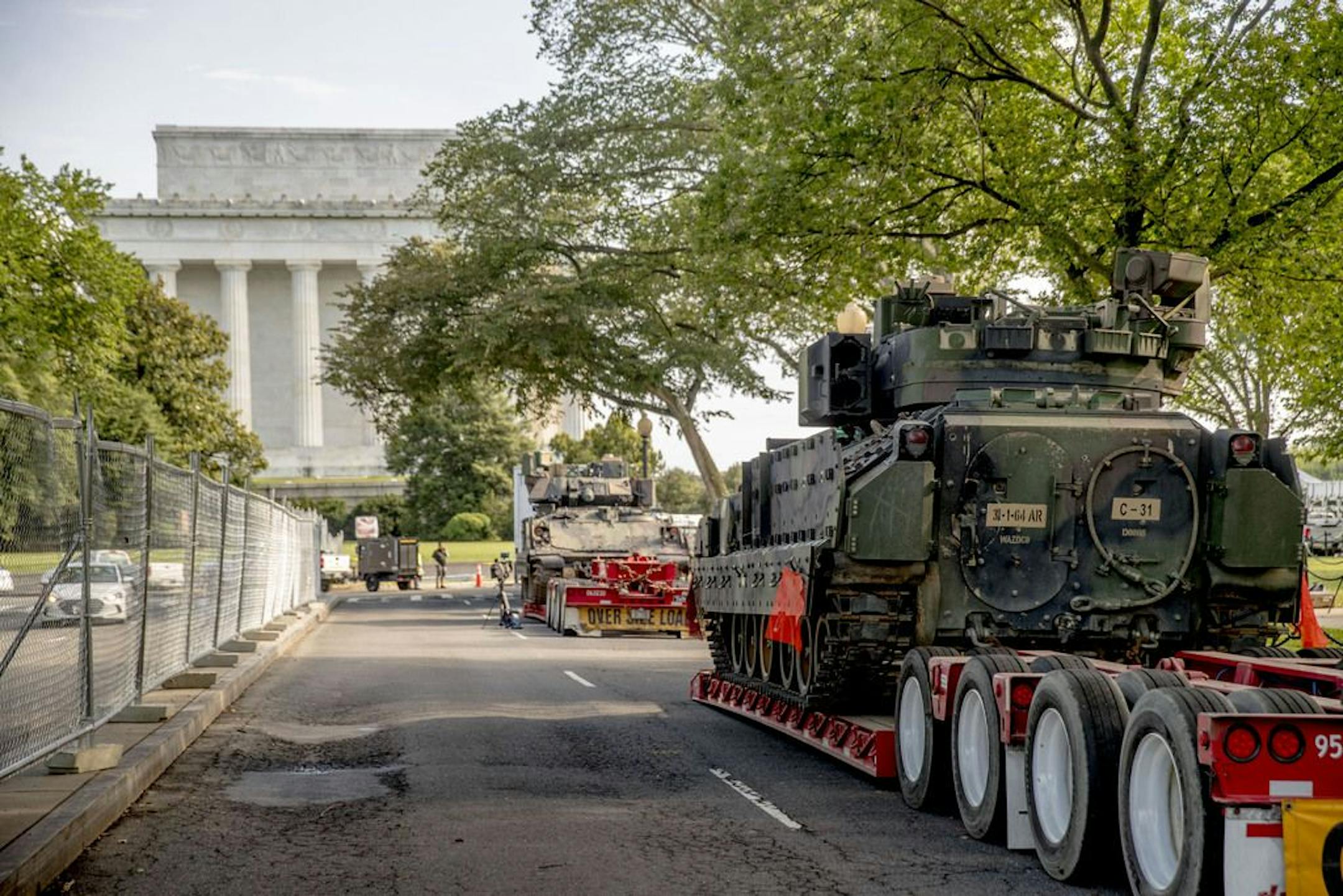 Two Bradley Fighting Vehicles are parked nearby the Lincoln Memorial for President Donald Trump's 'Salute to America' event honoring service branches on Independence Day, Tuesday, July 2, 2019, in Washington. President Donald Trump is promising military tanks along with "Incredible Flyovers & biggest ever Fireworks!" for the Fourth of July.