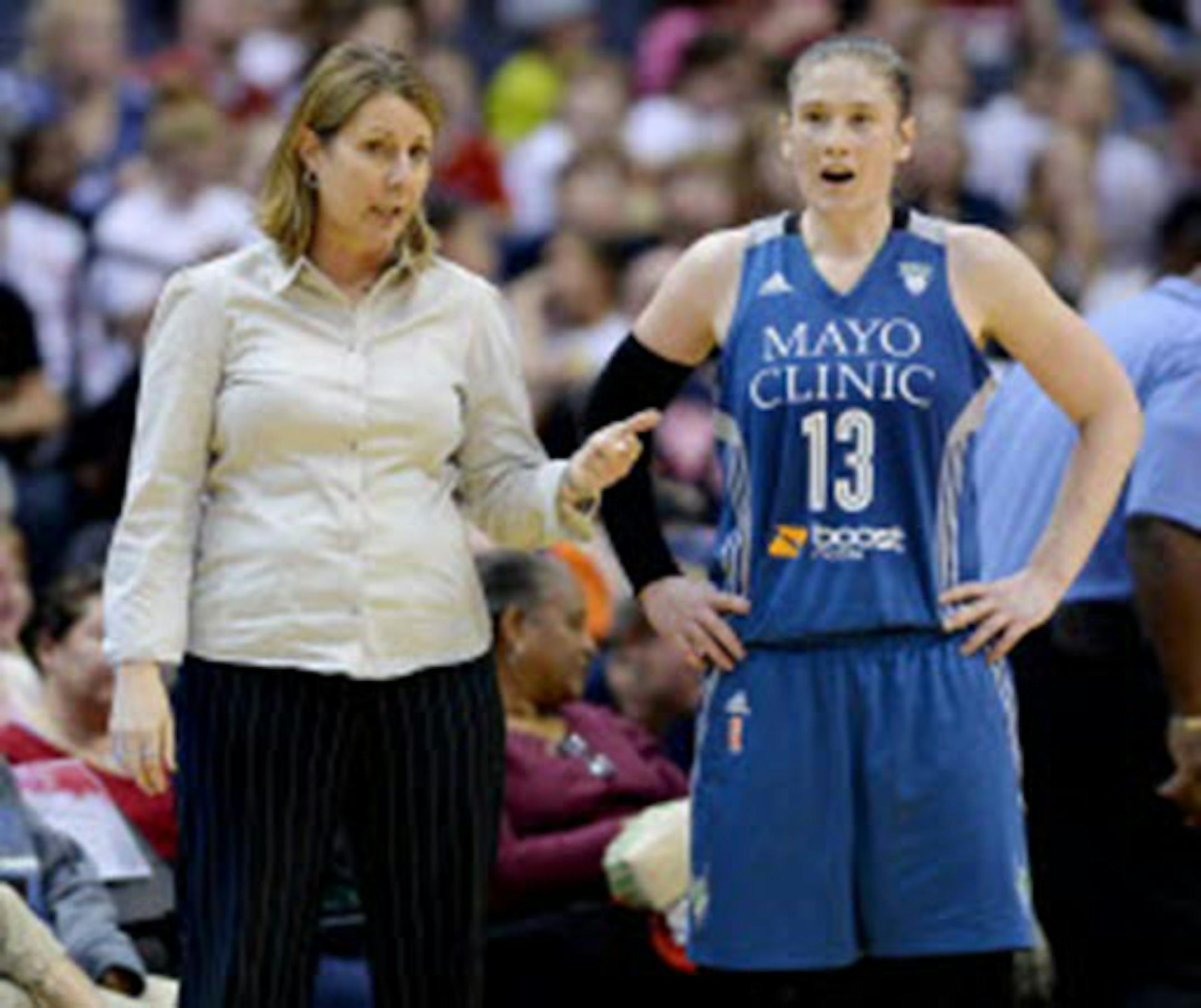Lynx guard Lindsay Whalen (right, shown with coach Cheryl Reeve during a May 16 game at Washington) scored 22 points to lead the Lynx over the Chicago Sky 75-72 on Monday.