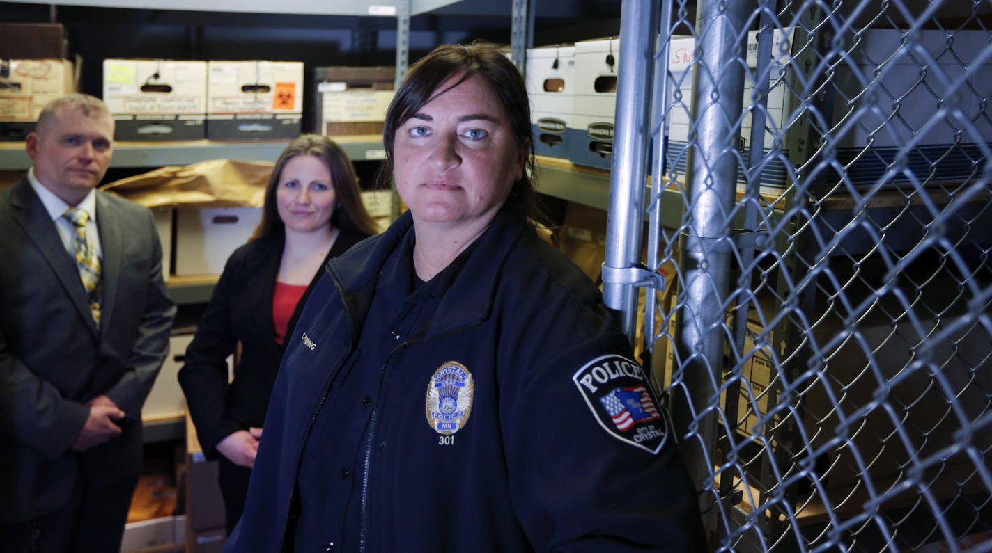 Crystal Police Chief Stephanie Revering (right) and primary investigators Lt. Derrick Hacker (left) and Inv. Julie Severson (center) in the evidence room at the Crystal police department. ] Brian.Peterson@startribune.com Crystal, MN - 03/09/2016