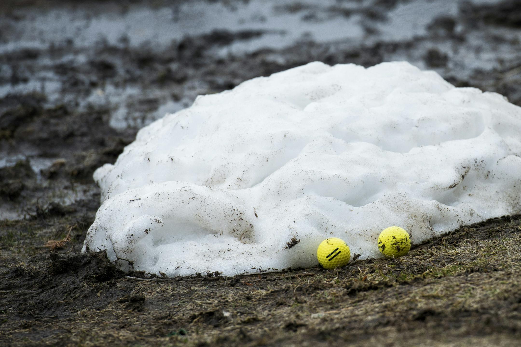With snow still covering most golf courses in Minnesota into the third week of April, Golf Zone, the year-round heated driving range in Chaska where crews plow the range, was doing a brisk business Monday, April 15, 2013. ] GLEN STUBBE * gstubbe@startribune.com