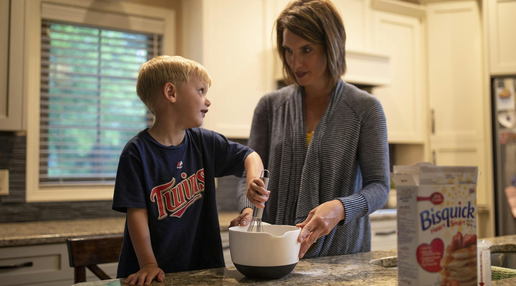 Ian Anderson helped mix the pancake batter with his mom, Mali while making breakfast for dinner in their kitchen. ] JEFF WHEELER ï jeff.wheeler@startribune.com It's gotten more difficult for couples to adopt children. Mali and Brady Anderson of Greenfield got lucky with an open adoption of their son, Ian, now four, who was adopted as an infant brother to their biological son, Chase, now 11. They were photographed at home Monday afternoon, June 11, 2018.