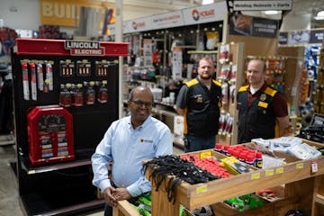 Northern Tool + Equipment CEO Suresh Krishna in the retailer’s Burnsville flagship store. He’s with store manager Jordan Kenyon and senior assista