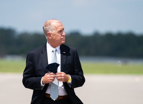 FILE -- Sen. Thom Tillis (R-N.C.) waits for President Donald Trump at Wilmington International Airport in Wilmington, N.C., Sept. 2, 2020. Tillis, who has embraced President Trump's plan to quickly replace Justice Ruth Bader Ginsburg, could become the deciding vote in the Senate. (Anna Moneymaker/The New York Times)