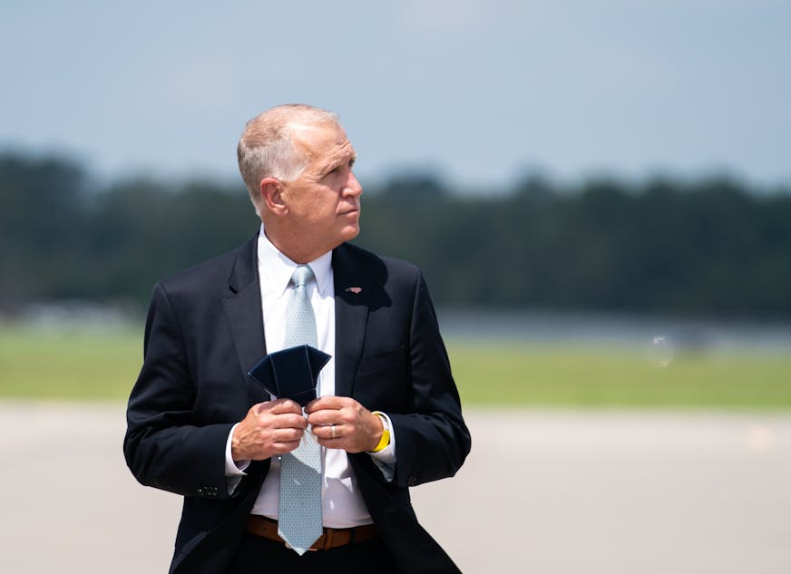 FILE -- Sen. Thom Tillis (R-N.C.) waits for President Donald Trump at Wilmington International Airport in Wilmington, N.C., Sept. 2, 2020. Tillis, who has embraced President Trump's plan to quickly replace Justice Ruth Bader Ginsburg, could become the deciding vote in the Senate. (Anna Moneymaker/The New York Times)