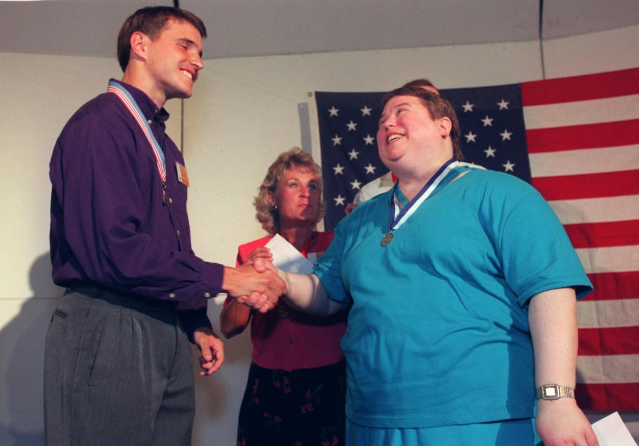 The title for the 1999 Great American Think-Off went to Mark Friestad, left, then a North Dakota high school teacher. He was congratulated by runner-up Laurie Lalko, then a community college English instructor from Arizona.