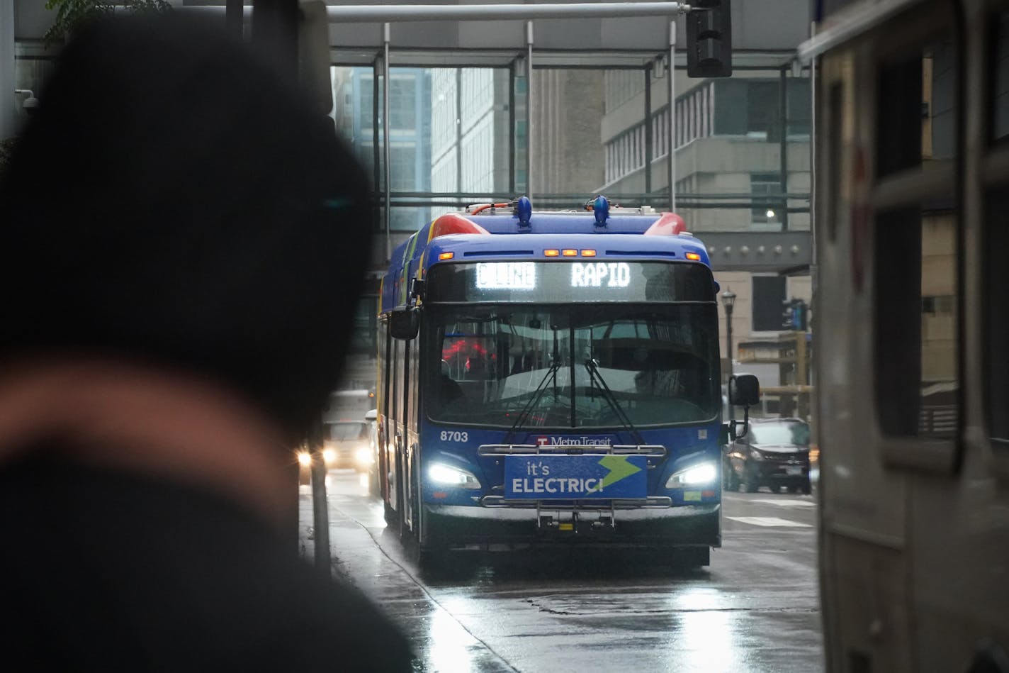 Riders awaited the C-Line Rapid Transit bus on 7th Street in downtown Minneapolis in October.